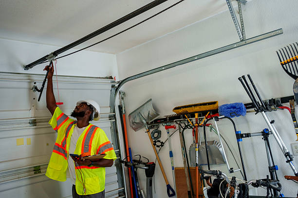 Professional Garage Door Panel Replacement technician working in Ashton, ID
